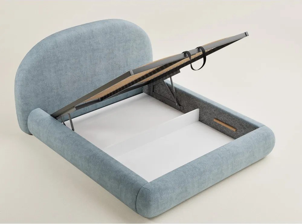 Jasnoniebieskie tapicerowane łóżko dwuosobowe ze schowkiem i stelażem 140x200 cm Maumere – Maison de Rêve