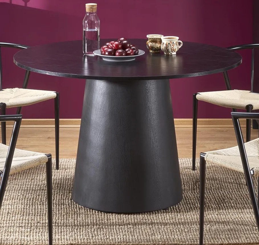 Okrągły stół na masywnej podstawie Ginter