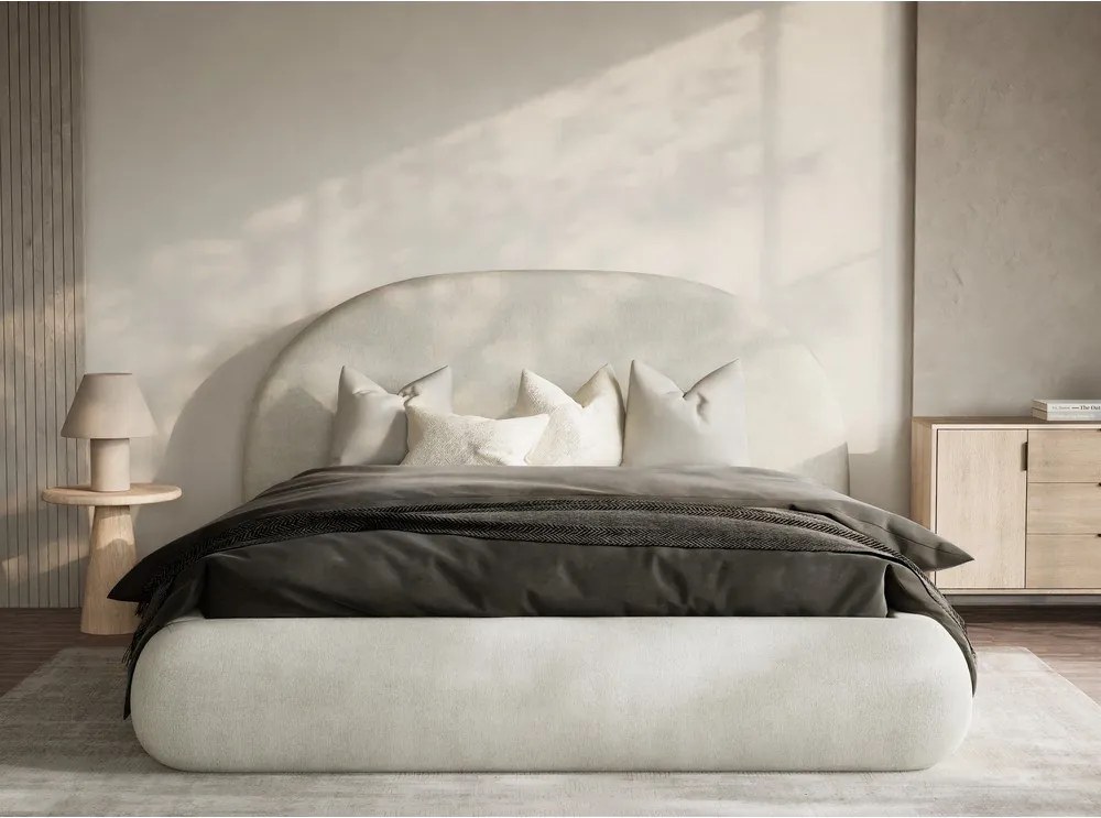 Kremowe tapicerowane łóżko dwuosobowe ze schowkiem i stelażem 180x200 cm Maumere – Maison de Rêve