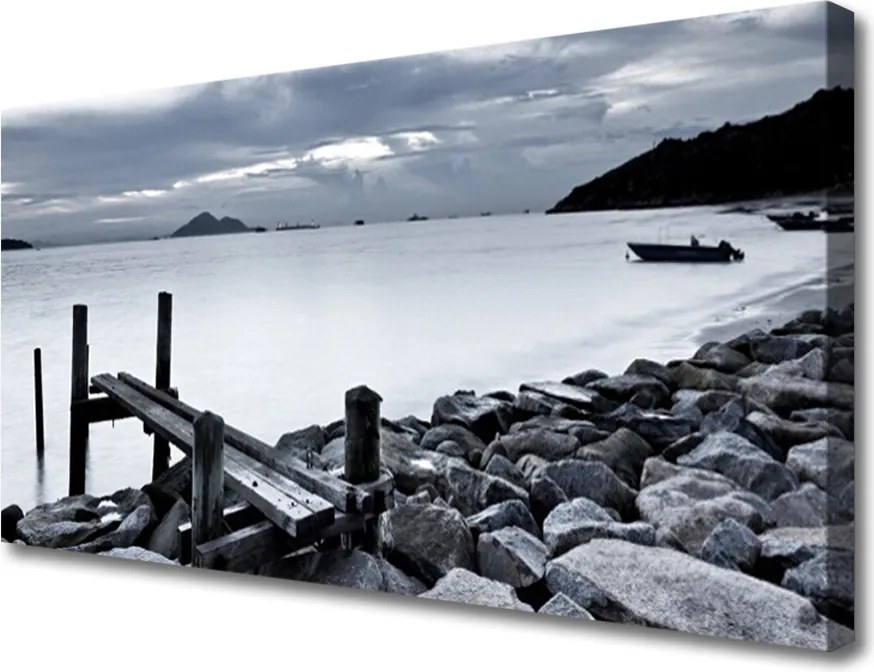 Obraz na płótnie Kamienista Plaża o Zmierzchu