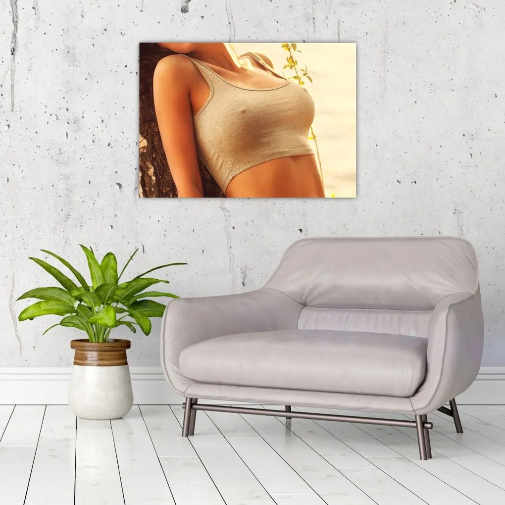 Obraz na szkle - Kobieta przy drzewie (70x50 cm)