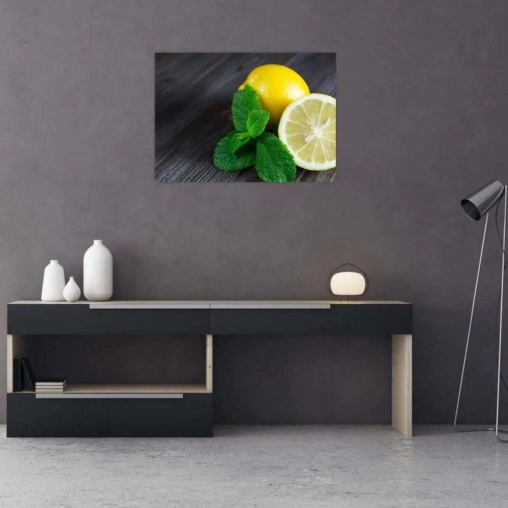 Obraz na szkle - cytryn i mięty na stole (70x50 cm)