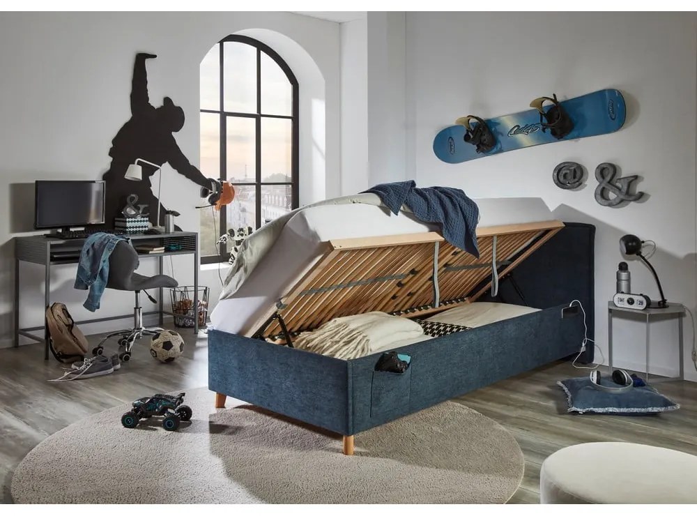 Ciemnoniebieskie tapicerowane łóżko dziecięce ze schowkiem ze stelażem 90x200 cm Fun – Meise Möbel