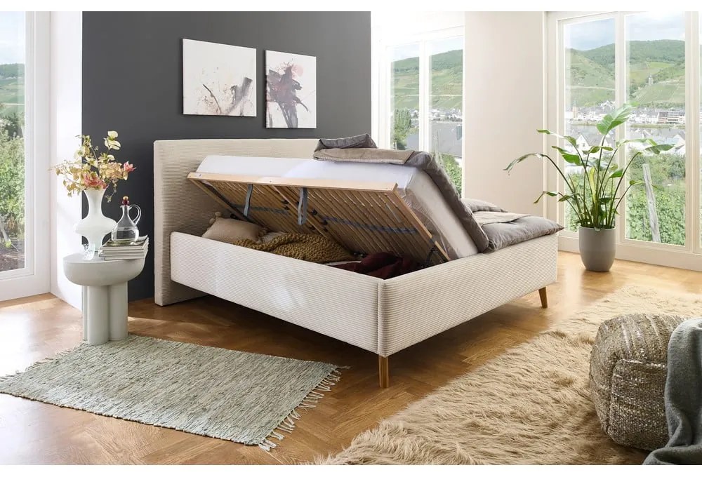 Beżowe tapicerowane łóżko dwuosobowe ze schowkiem i stelażem 180x200 cm Madea – Meise Möbel