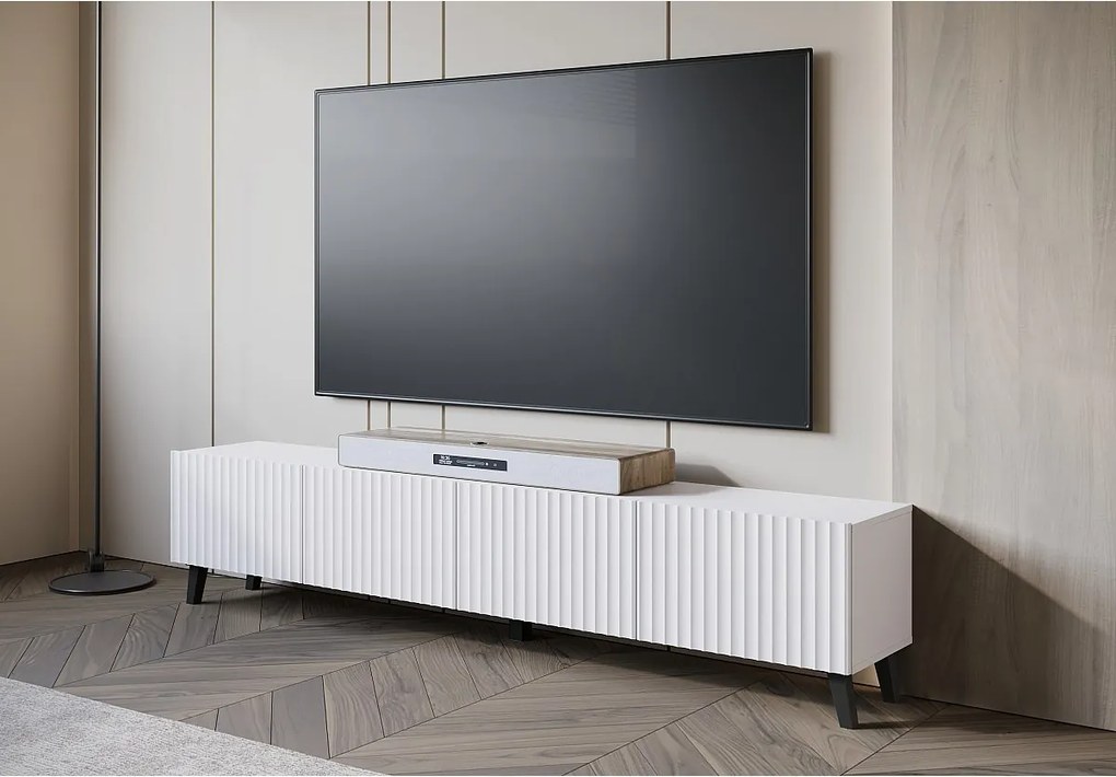 Nowoczesna szafka RTV 190 cm biały na nóżkach do salonu, fronty MDF frezowane w szerokie ryfle