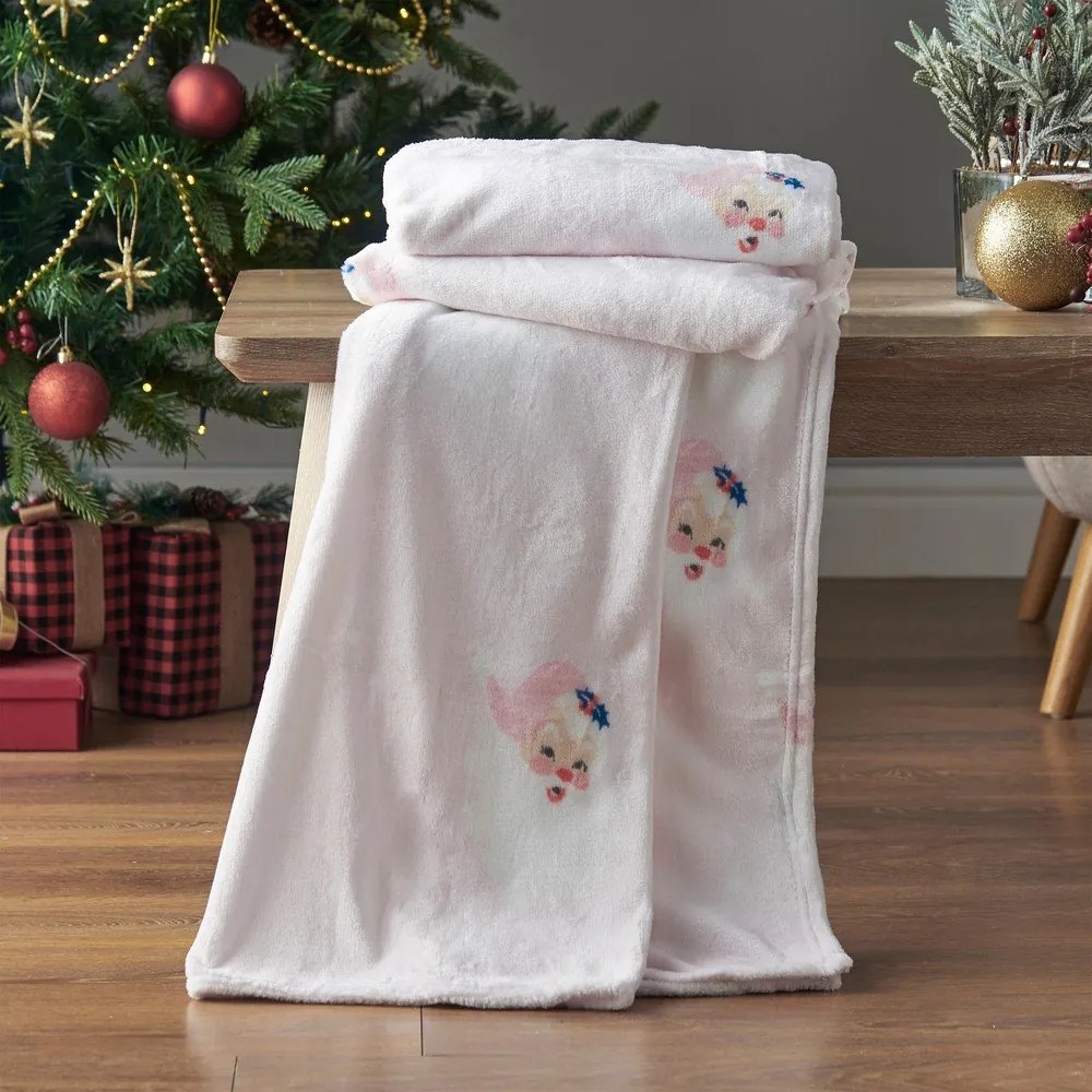 Jasnoróżowy koc ze świątecznym motywem z mikropluszu 130x170 cm Vintage Christmas Santa – Catherine Lansfield