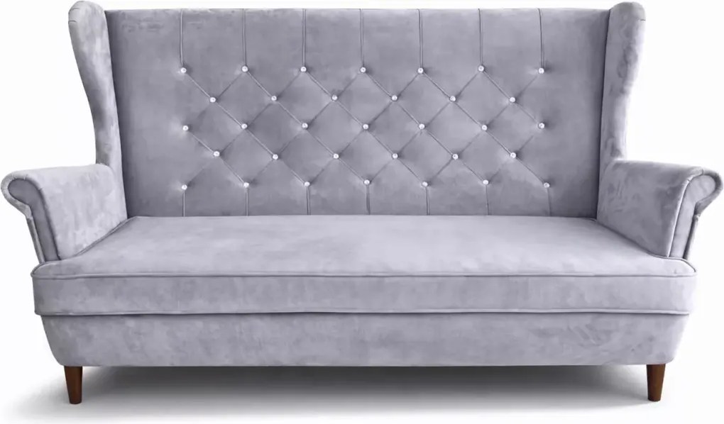 Nowoczesna sofa uszak z przeszyciami i pikowaniem po całości