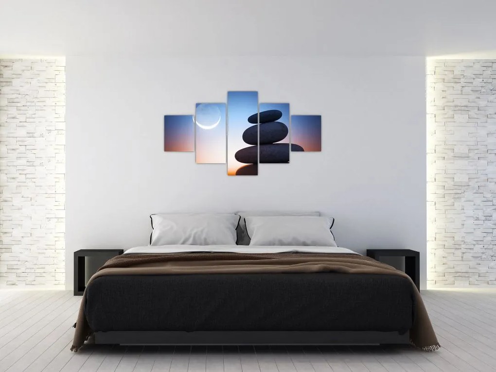 Obraz ułożonych kamieni jeden na drugim (125x70 cm)