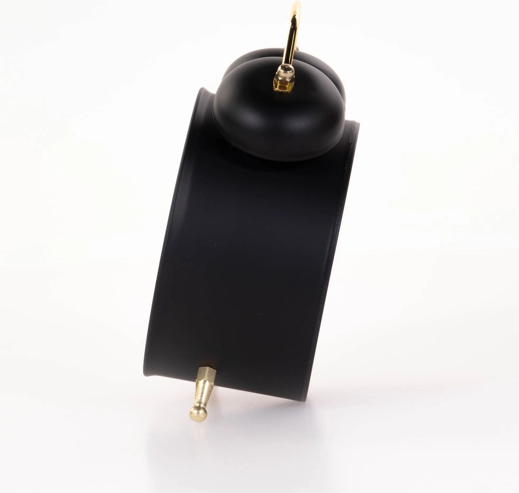 Zegarek budzik ze złotymi wskazówkami