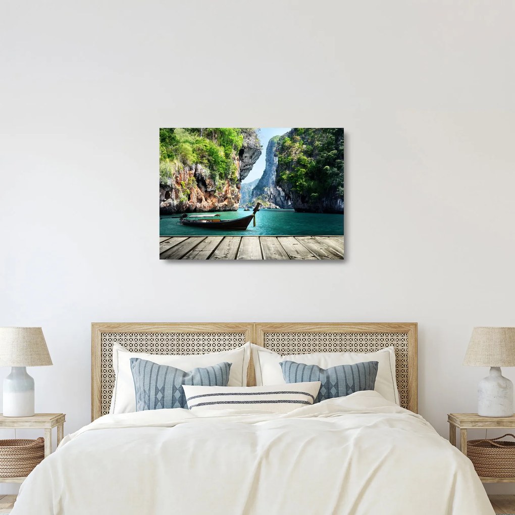 Obraz na szkle długiej łodzi na plaży (70x50 cm)