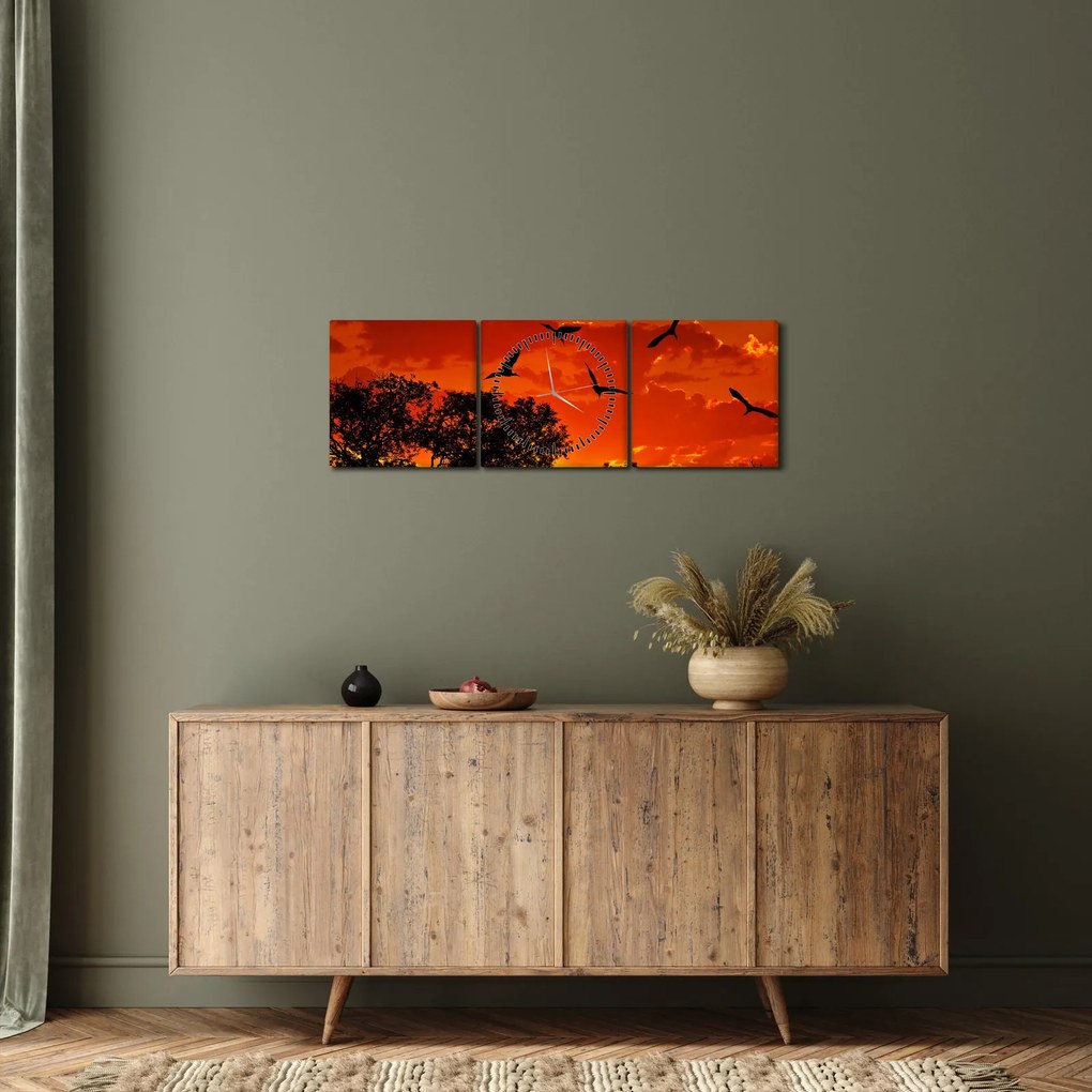 Obraz ptaków o zachodzie słońca (z zegarem) (90x30 cm)