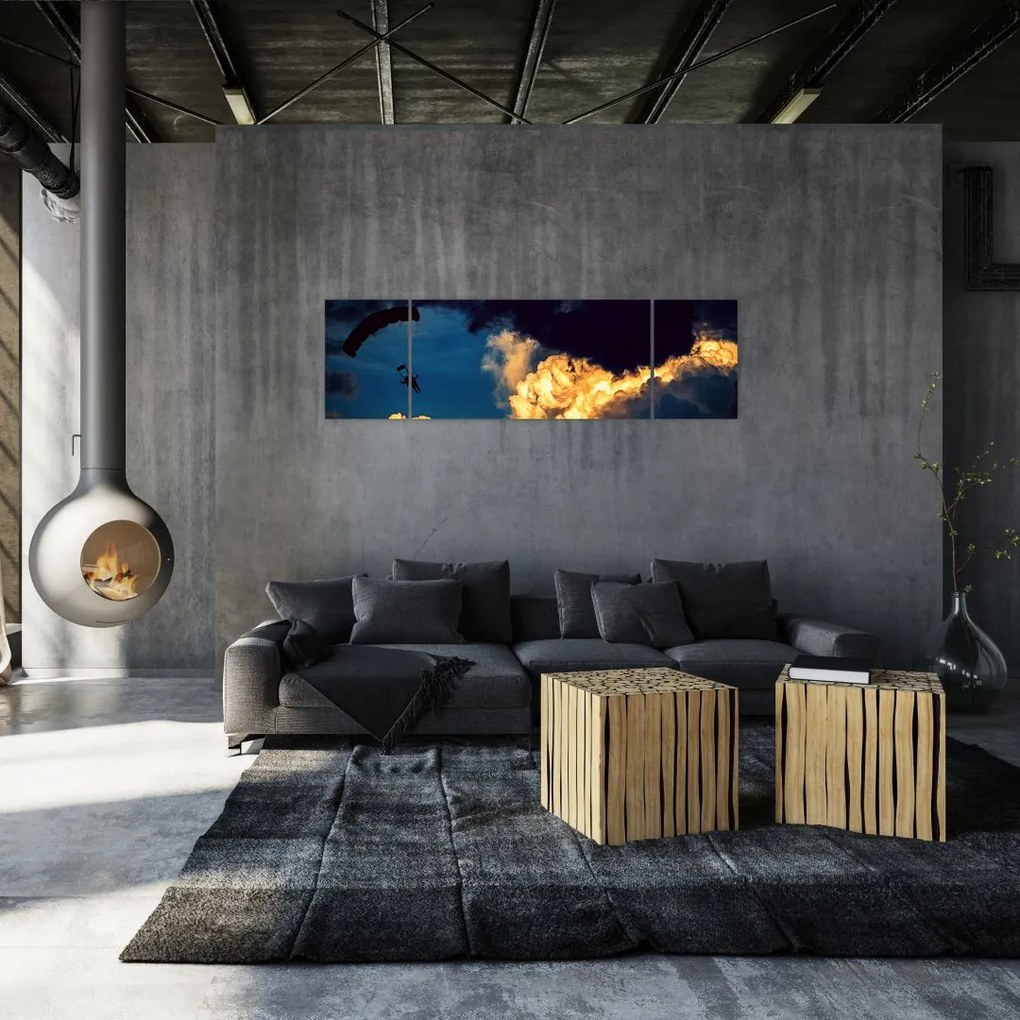Obraz skoczka spadochronowego w chmurach (170x50 cm)