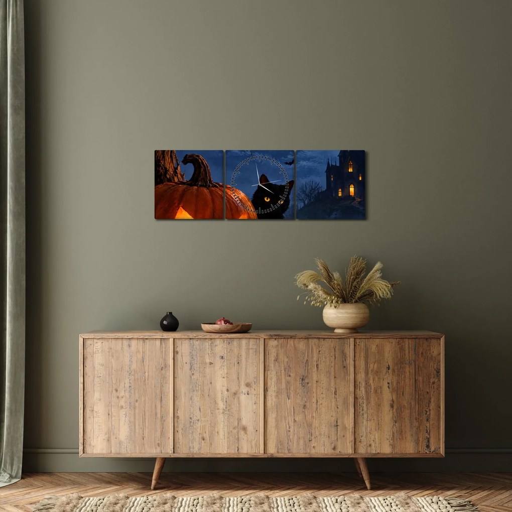 Obraz - Czarny kot przy świecącej dyni na Halloween (z zegarem) (90x30 cm)