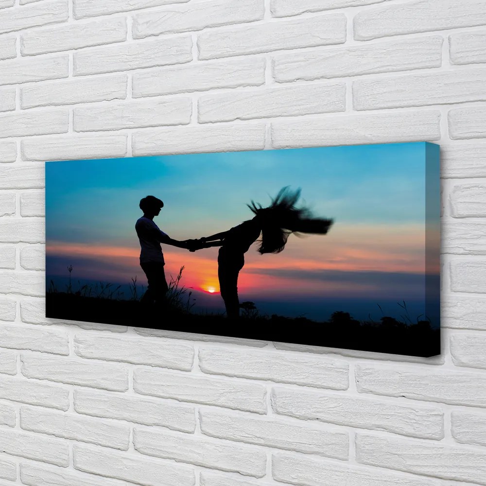 Fotoobraz na płótnie Ludzie na Tle Zachodu Nieba