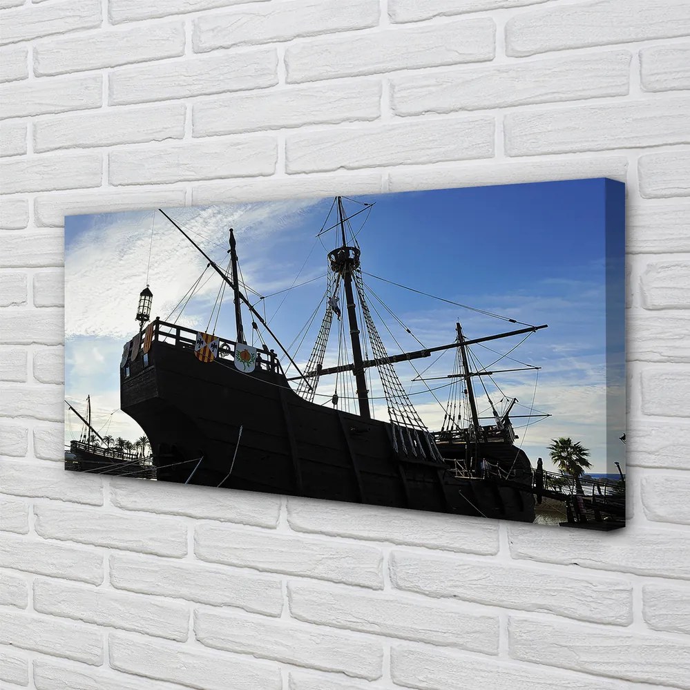 Duży obraz na płótnie Sylwetka Statku pod Niebem