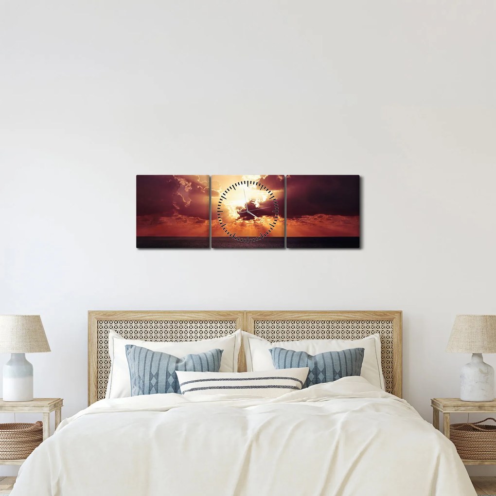 Obraz słońca za chmurami (z zegarem) (90x30 cm)