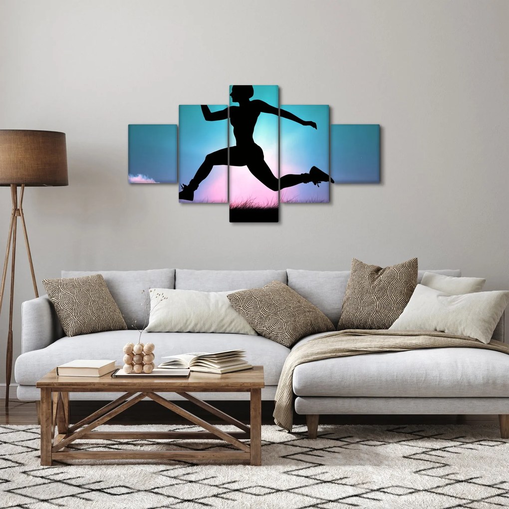 Obraz skaczącej sylwetki kobiety (125x70 cm)