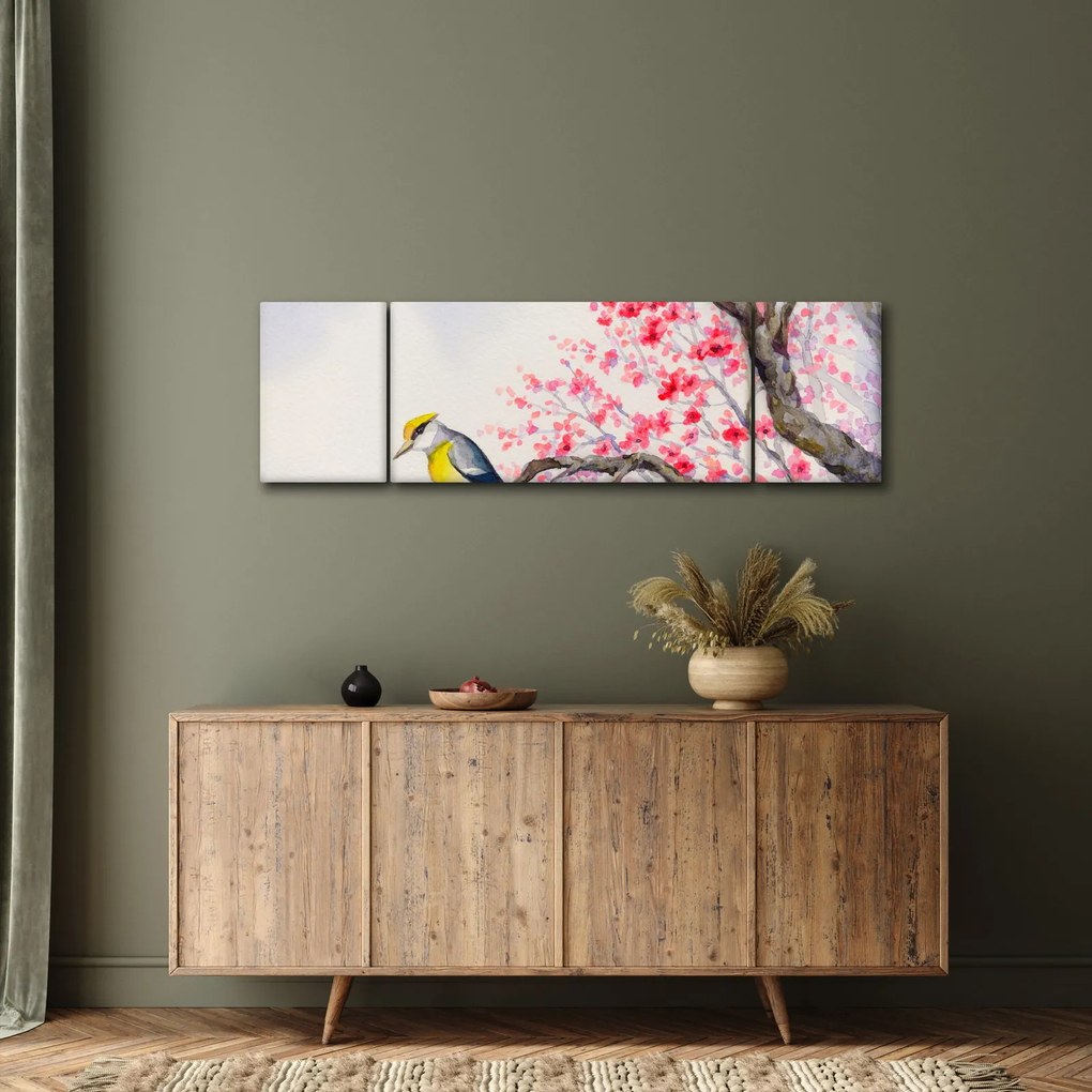 Obraz - ptak na drzewie z czerwonymi kwiatami (170x50 cm)