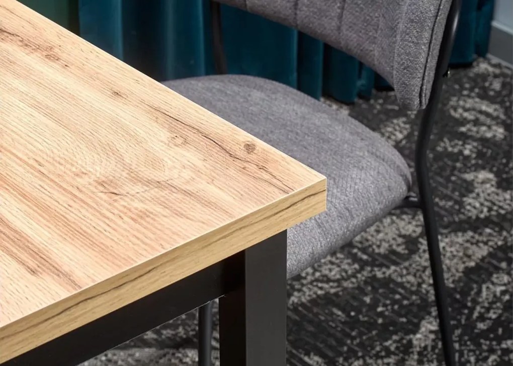Nowoczesny stół Dendy 120x68 cm prostokątny z blatem z płyty laminowanej w odcieniu dąb wotan i metalowymi czarnymi nogami