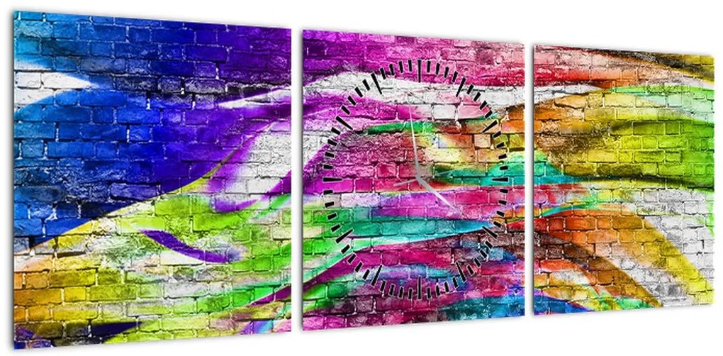 Obraz - Mur z cegły z kolorowymi płomieniami (z zegarem) (90x30 cm)