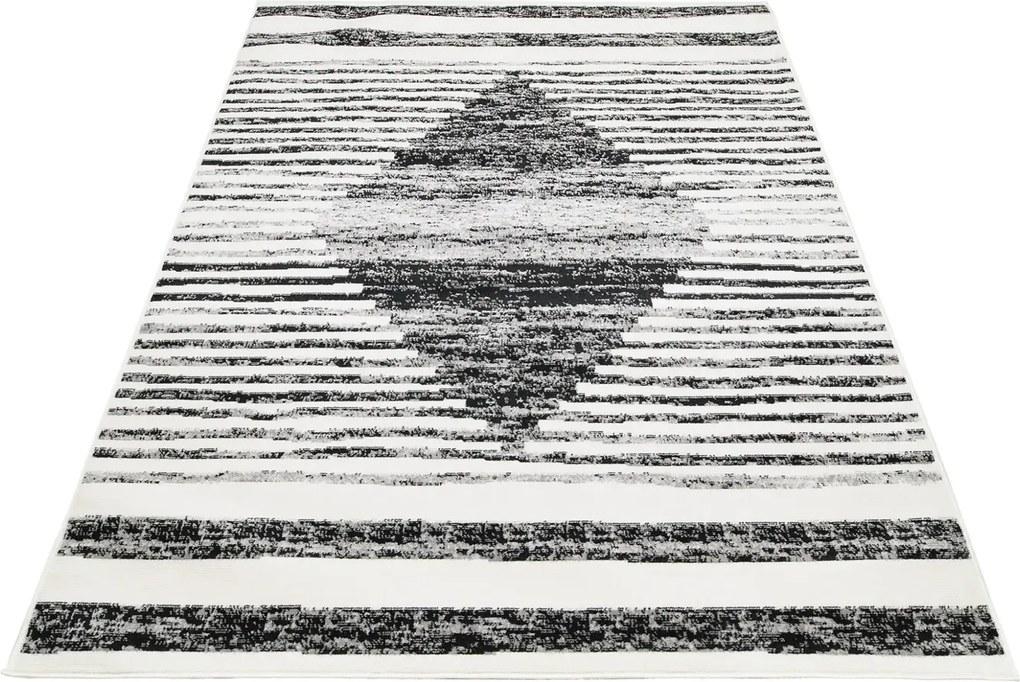 Elegancki czarno - biały dywan w nowoczesny stylu H4-L64