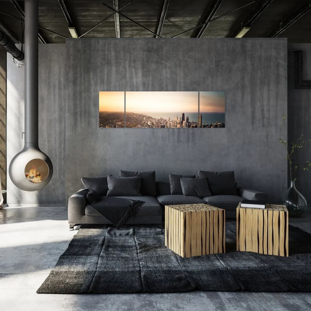 Obraz zachodu słońca nad miastem (170x50 cm)