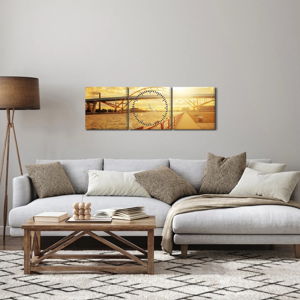 Obraz mostu z zachodem słońca (z zegarem) (90x30 cm)
