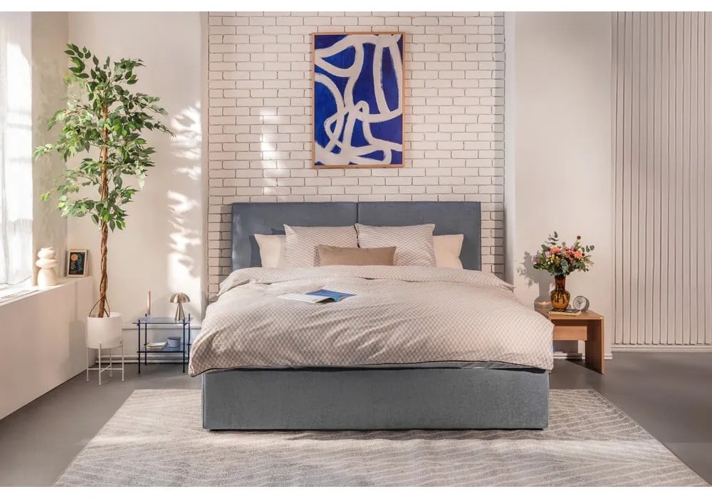 Niebieskie tapicerowane łóżko dwuosobowe ze schowkiem z materacem i stelażem 180x200 cm Thessa Bold – Bonami Selection
