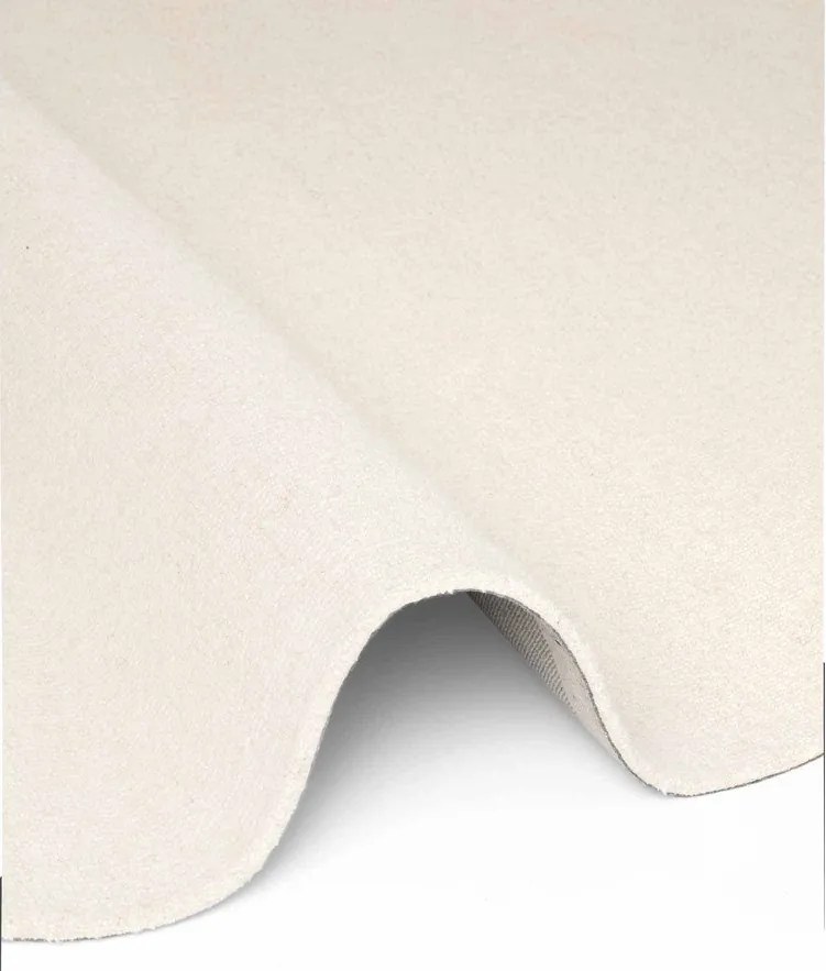 Kremowy wełniany okrągły dywan tkany ręcznie ø 160 cm Puristic Knots – Elle Decoration