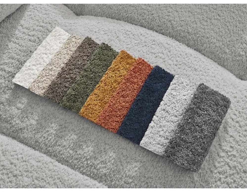 Jasnoszary rozkładany narożnik z materiału bouclé ze schowkiem (prawostronny/z szezlongiem) Roxelane – Bobochic Paris