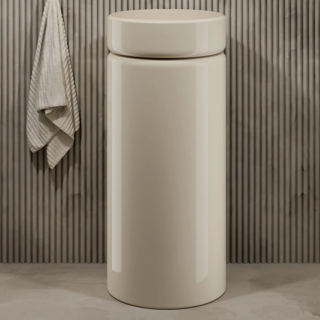 Umywalka z konglomeratu wolnostojąca okrągła beżowa błyszcząca 85 x 40 cm RONA Beige Glow : Podłączenie syfonu - Do ściany