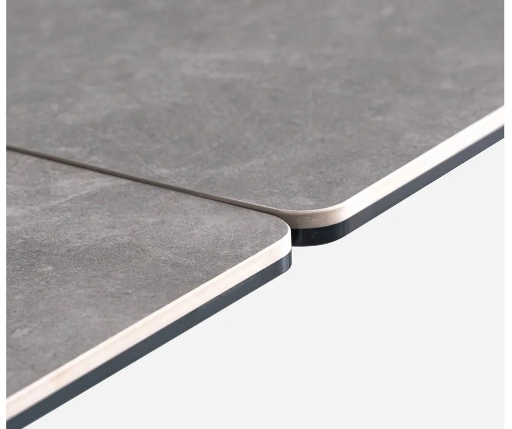 Nowoczesny stół rozkładany Nexus 200(280)×90 cm zachwyca eleganckim białym blatem z masy ceramicznej i solidną podstawą ze stali szczotkowanej. Styl, trwałość i funkcjonalność w jednym – idealny do jadalni i salonu.