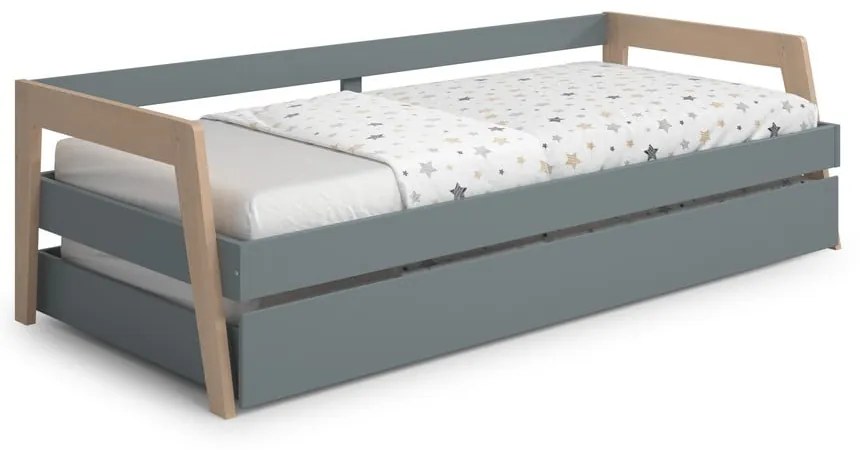 Zielone łóżko dziecięce z drewna sosnowego z wysuwanym łóżkiem i schowkiem 90x200 cm Carrie – Marckeric