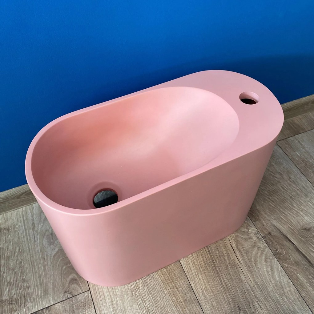 Umywalka z kamienia syntetycznego nablatowa / wisząca owalna różowa 45 x 22 cm OVELA Pink