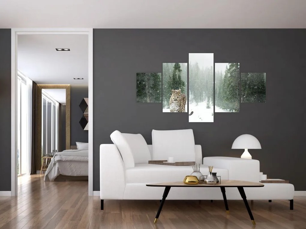 Obraz lamparta na śniegu (125x70 cm)