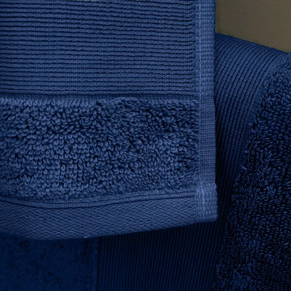 Ciemnoniebieski bawełniany ręcznik frotte 50x85 cm Anti-Bacterial – Catherine Lansfield