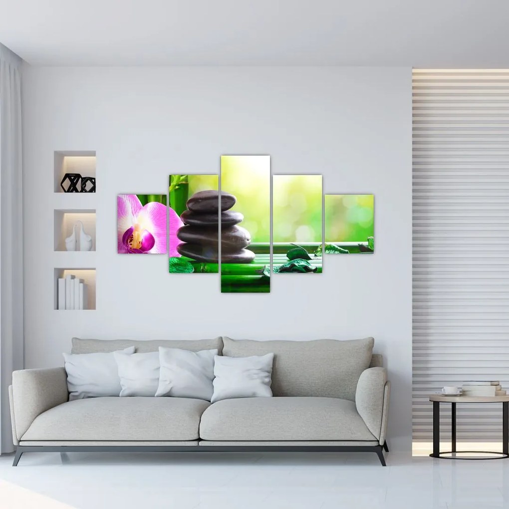 Obraz kamieni do masażu i storczyków na wodzie (125x70 cm)