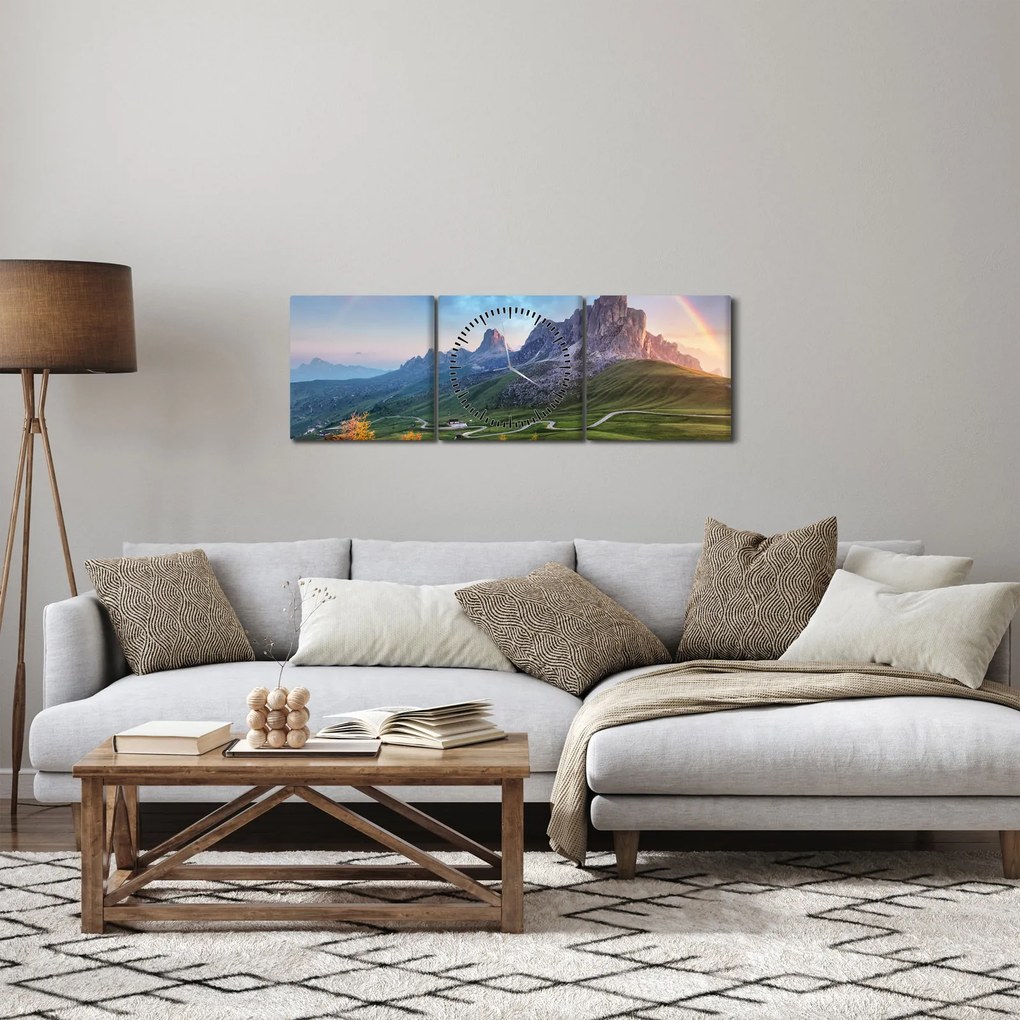 Obraz tęczy nad skałami (z zegarem) (90x30 cm)
