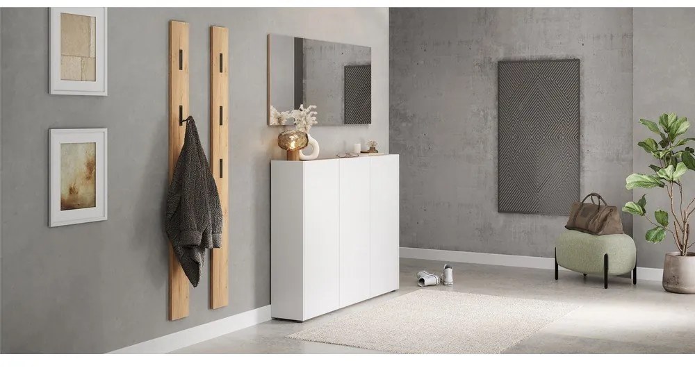 Biała szafka w dekorze dębu 138x105x25 cm Libbiano – Germania