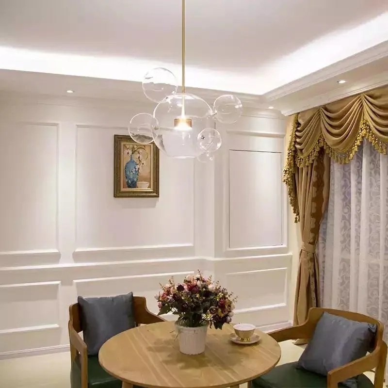 Lampa wisząca z okrągłymi kloszami Capri 6 złota