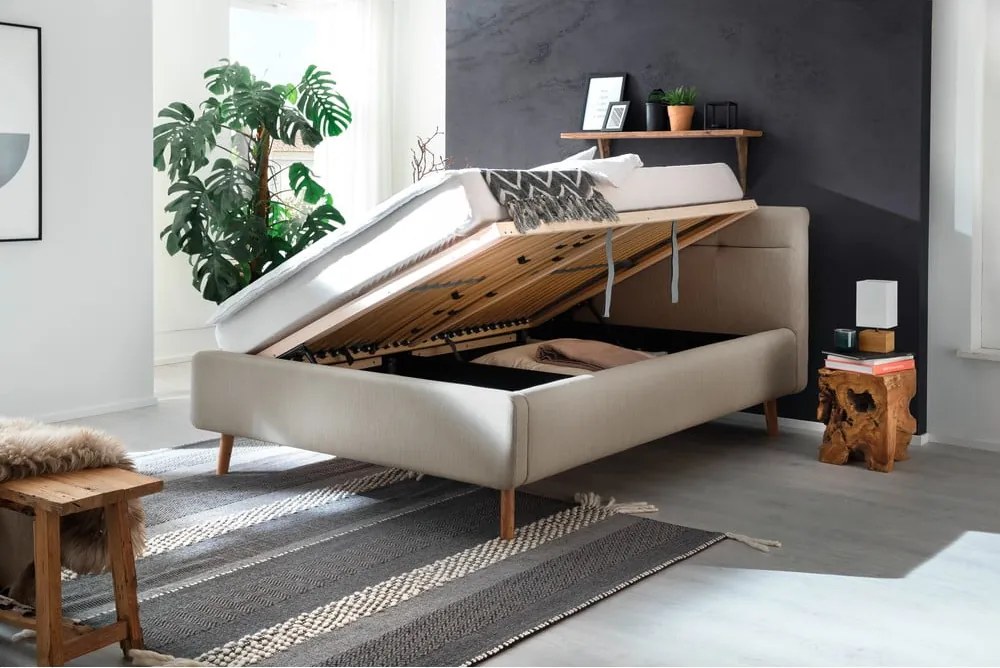 Beżowe tapicerowane łóżko dwuosobowe ze schowkiem ze stelażem 140x200 cm Lotte – Meise Möbel