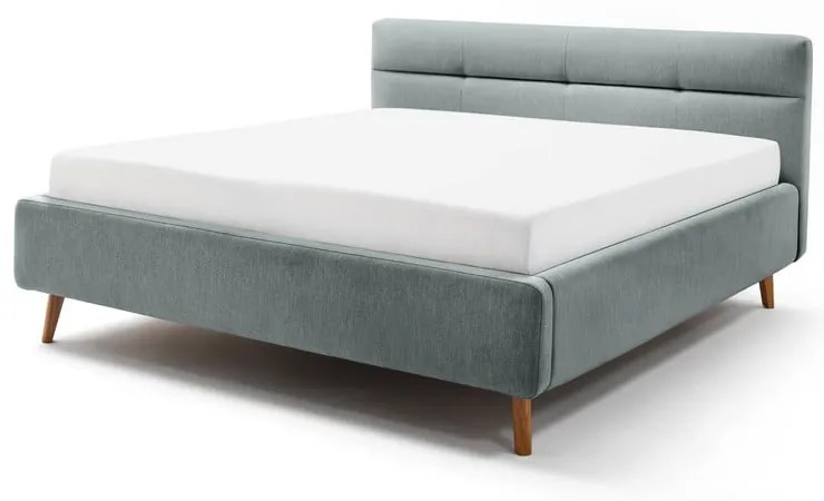 Jasnoniebieske tapicerowane łóżko dwuosobowe ze schowkiem i stelażem 180x200 cm Lotte – Meise Möbel