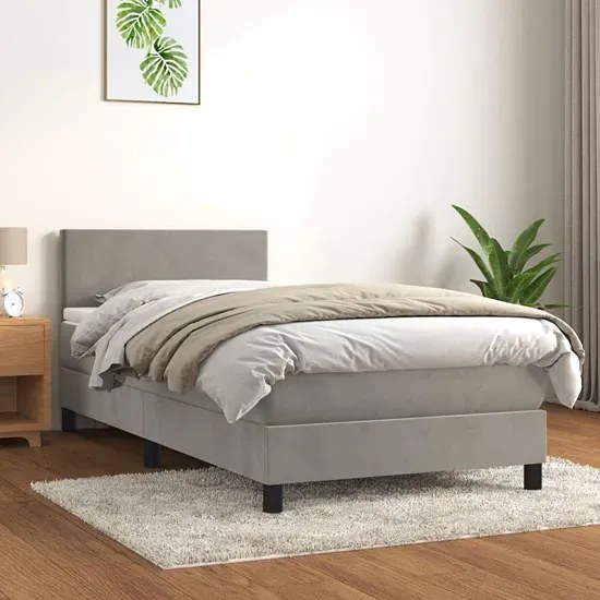 Jasnoszare tapicerowane łóżko z materacem 90x200 Mefir
