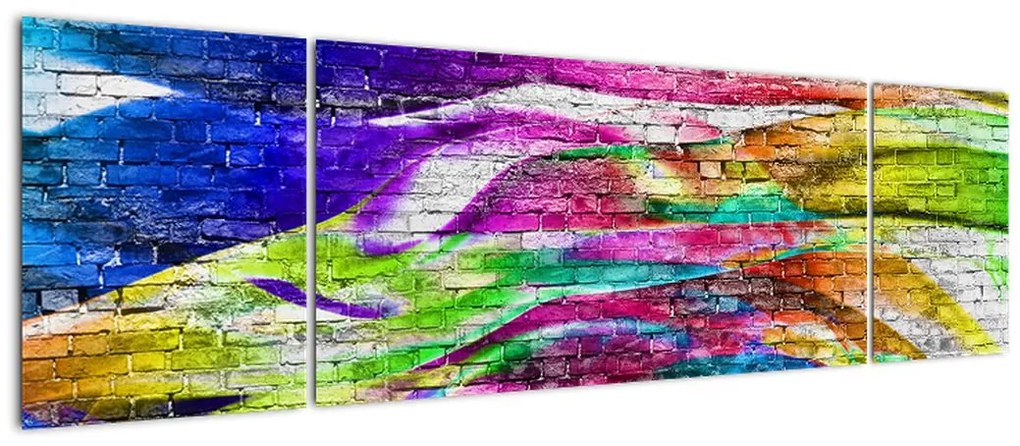 Obraz - Mur z cegły z kolorowymi płomieniami (170x50 cm)