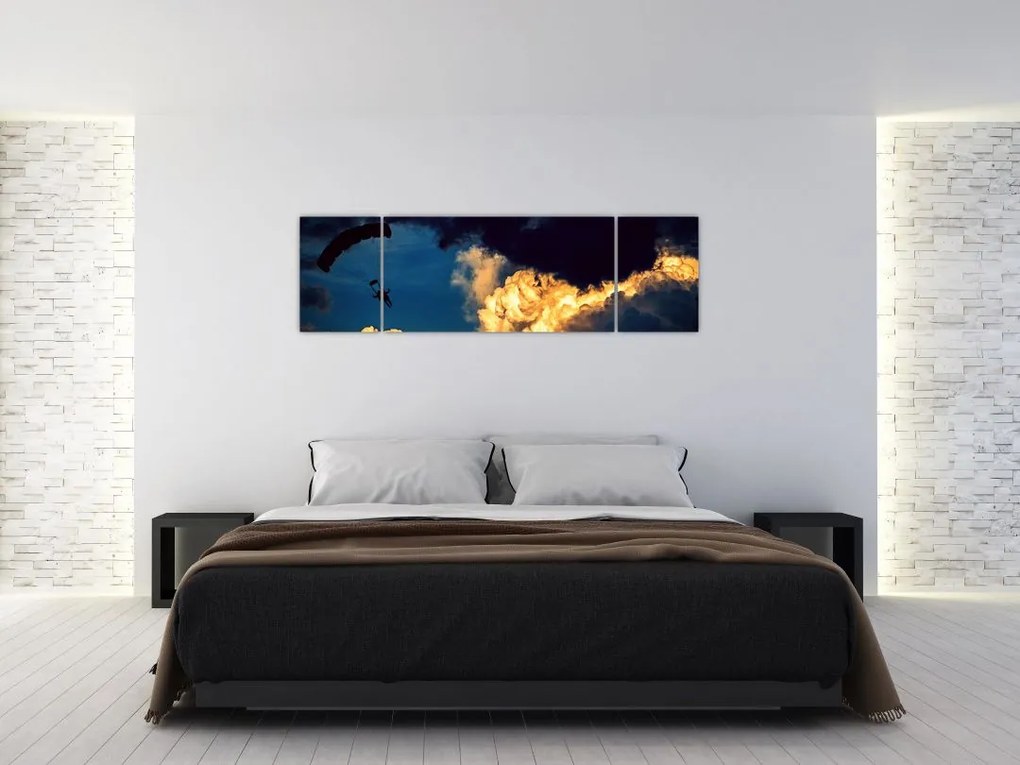 Obraz skoczka spadochronowego w chmurach (170x50 cm)
