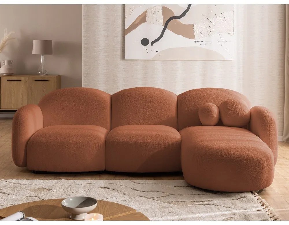 Narożnik z materiału bouclé (prawostronny/z szezlongiem) w kolorze terakoty Orbit – Ropez