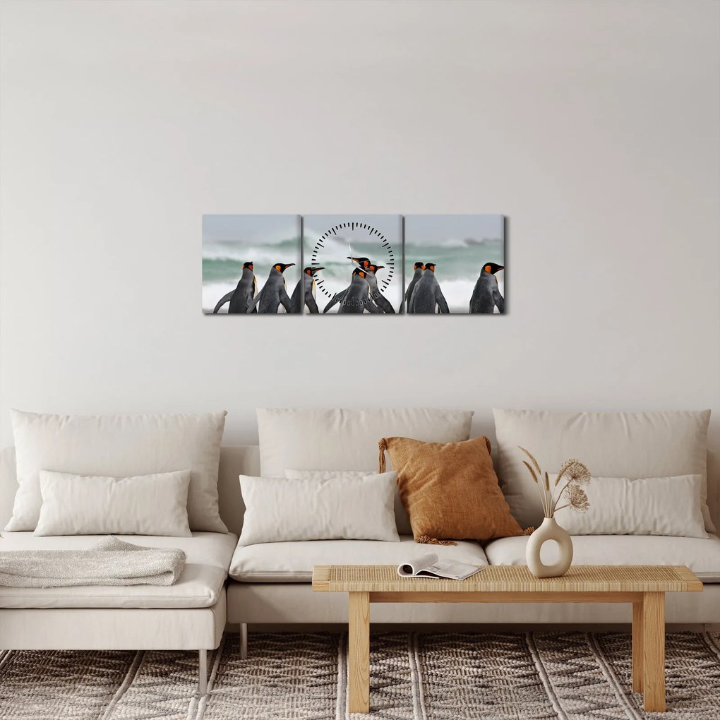 Obraz pingwinów nad oceanem (z zegarem) (90x30 cm)