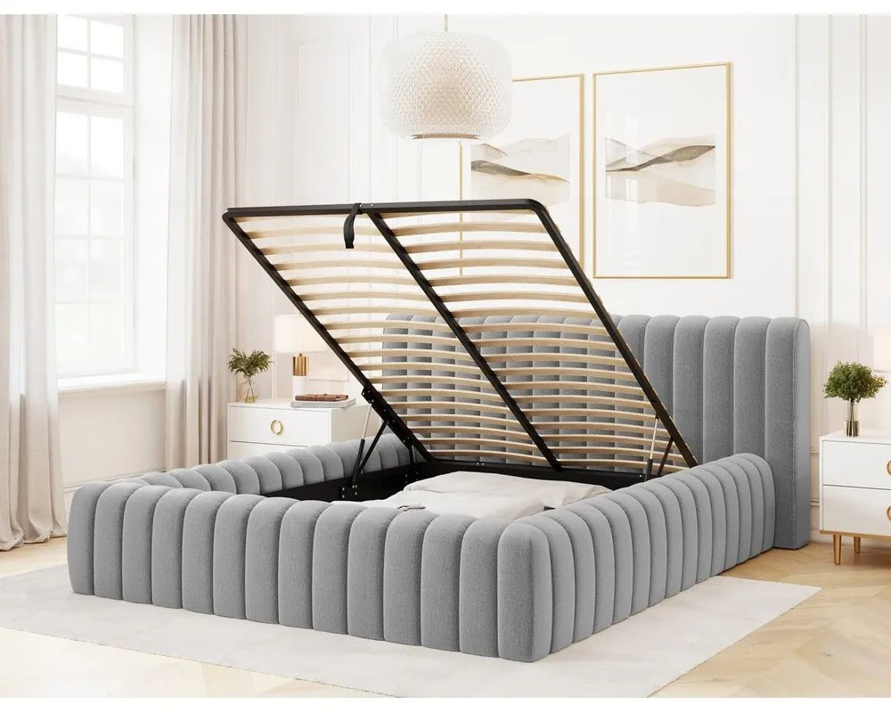 Jasnoszare tapicerowane łóżko dwuosobowe ze schowkiem ze stelażem 140x200 cm Carilla – ELTAP