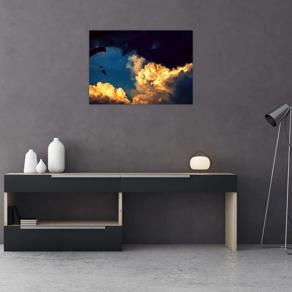 Obraz skoczka spadochronowego w chmurach (70x50 cm)