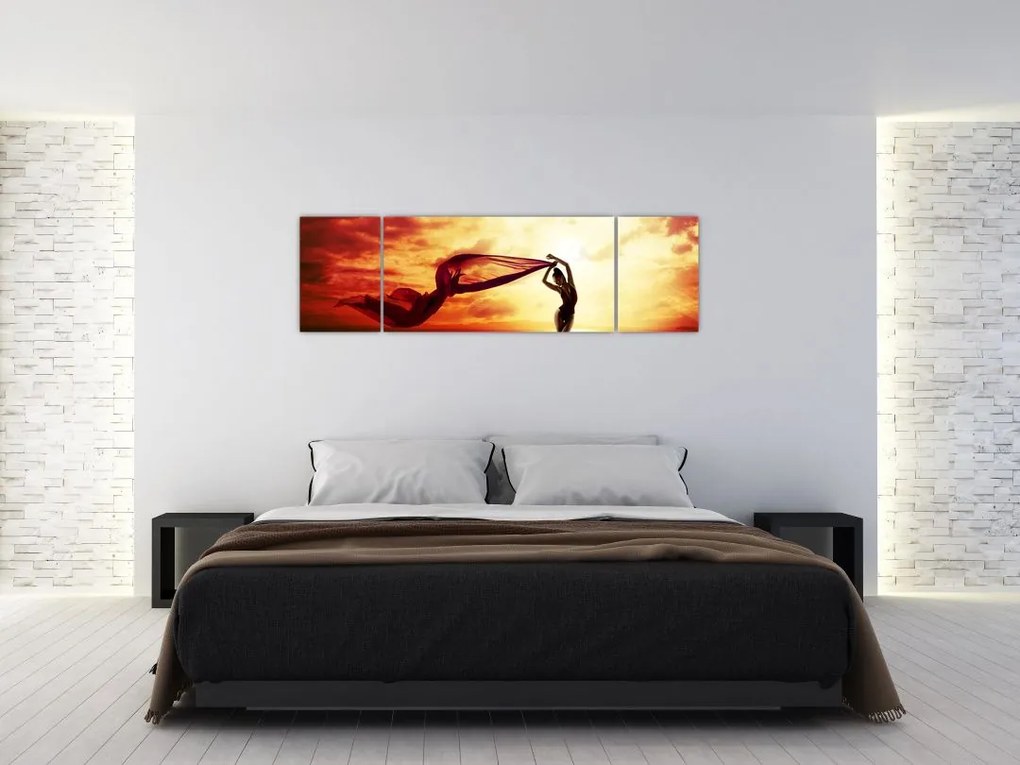 Obraz - Sylwetka kobiety o zachodzie słońca (170x50 cm)